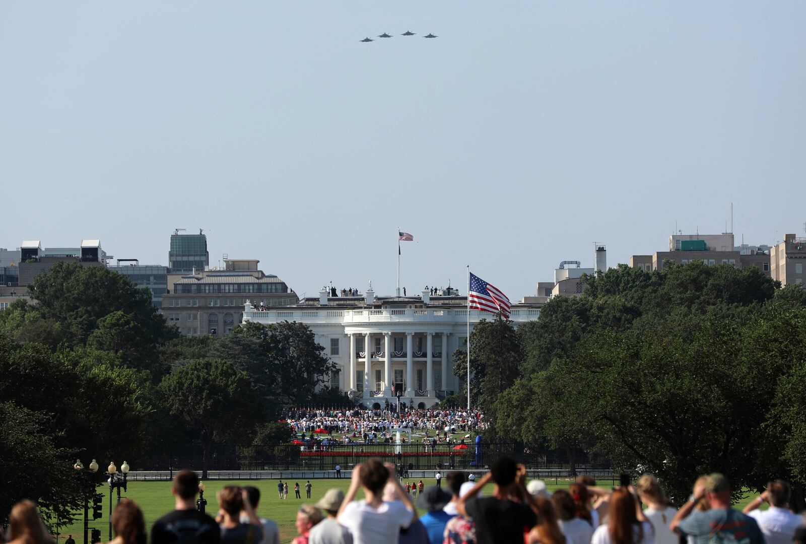 Military aircraft conduct a flyover during a Fourth of July celebration at the White House, Friday, July 4, 2025, in Washington. (AP Photo/Rahmat Gul)