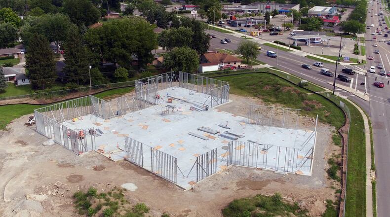 The new Wilmington-Stroop Branch Library is taking shape at the corner of Stroop and Wilmington in Kettering. The new library will be 51 percent larger than the old branch and is expected to open in spring 2019. TY GREENLEES / STAFF