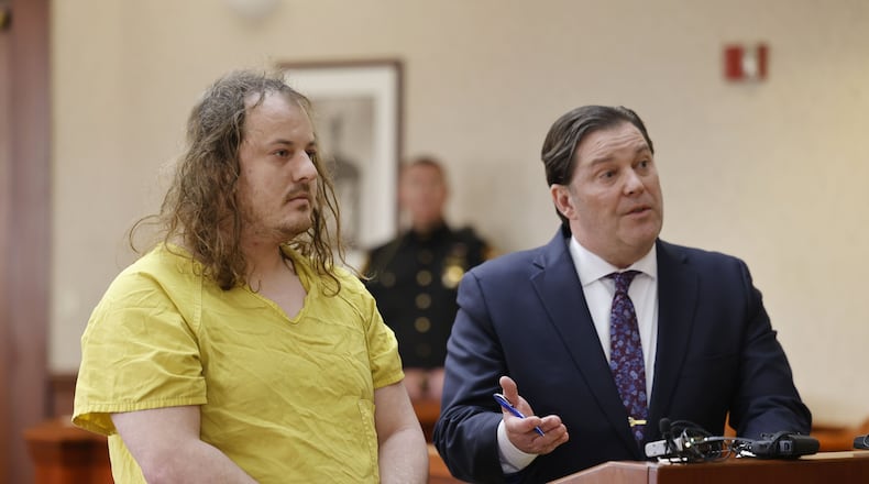 Jonathan Palmerton, left, with defense attorney Kenneth Crehan, was arraigned on a perjury charge in connection to the Katelyn Markham death case Wednesday, Feb. 22, 2023 in front of Judge Jennifer McElfresh in Butler County Common Pleas Court in Hamilton. NICK GRAHAM/STAFF