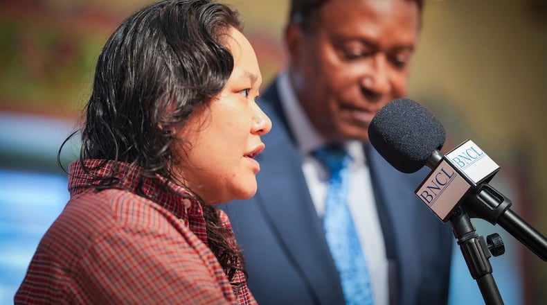 Georgia Savageford speaks during a news conference in Minneapolis, Thursday, March 26, 2026, about being detained by federal agents. (Leila Navidi/Minnesota Star Tribune via AP)