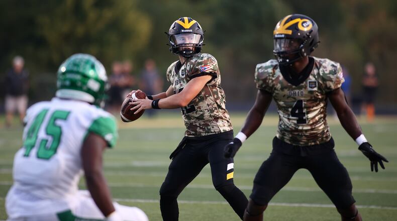 Centerville's Drake Wells throws a pass against Northmont on Friday, Sept. 16, 2022, in Centerville. David Jablonski/Staff