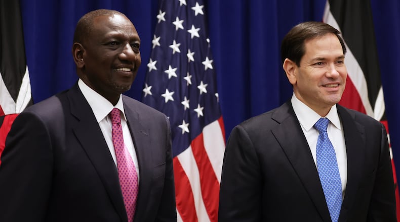 FILE - U.S. Secretary of State Marco Rubio, right, and Kenyan President William Ruto pose for photos before a meeting, Sept. 24, 2025, in New York. (AP Photo/Heather Khalifa, Pool, file)