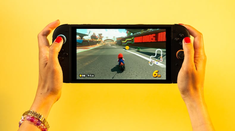 A Nintendo Switch 2 playing Mario Kart World in Renton, Wash. on June 7, 2025. Hardware improvements in the new $450 Nintendo Switch 2 will make this an automatic upgrade for fans of the two-in-one console. (Chona Kasinger/The New York Times)