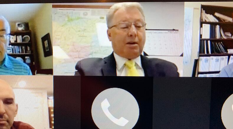 Greene County Commissioner Tom Koogler reads a statement in August asking the Miami Valley Regional Planning Commission board of directors to table a resolution naming racism a public health emergency. SUBMITTED