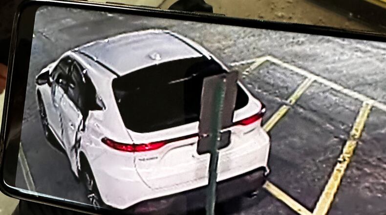 This late model white Toyota Venza was captured on surveillance camera outside the Springboro Pharmacy following a break-in early Thursday morning. Springboro police believe this vehicle is part of other pharmacy break-ins Thursday in Springfield and in Beavercreek. CONTRIBUTED/SPRINGBORO POLICE