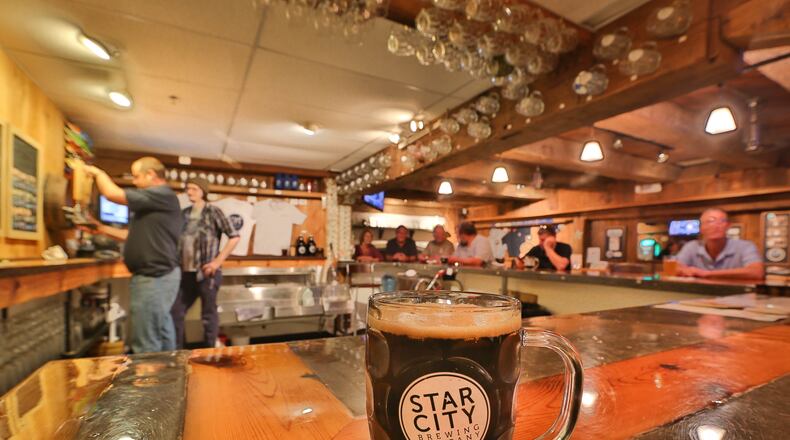 Star City Brewing Company's Smoked Porter in their tasting Room in the former Peerless Mill building in Miamisburg. JIM WITMER/STAFF
