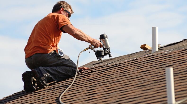 Following a few basic hiring rules will ensure a successful outcome for your roofing project. (Dreamstime)
