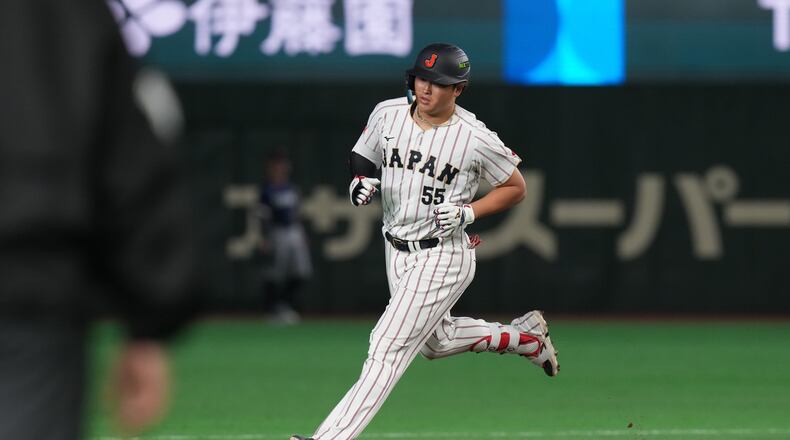 Japan's Munetaka Murakami runs for his grand slam home run during the eighth inning of a World Baseball Classic game between Japan and the Czech Republic on Tuesday, March 10, 2026 in Tokyo. (AP Photo/Eugene Hoshiko)