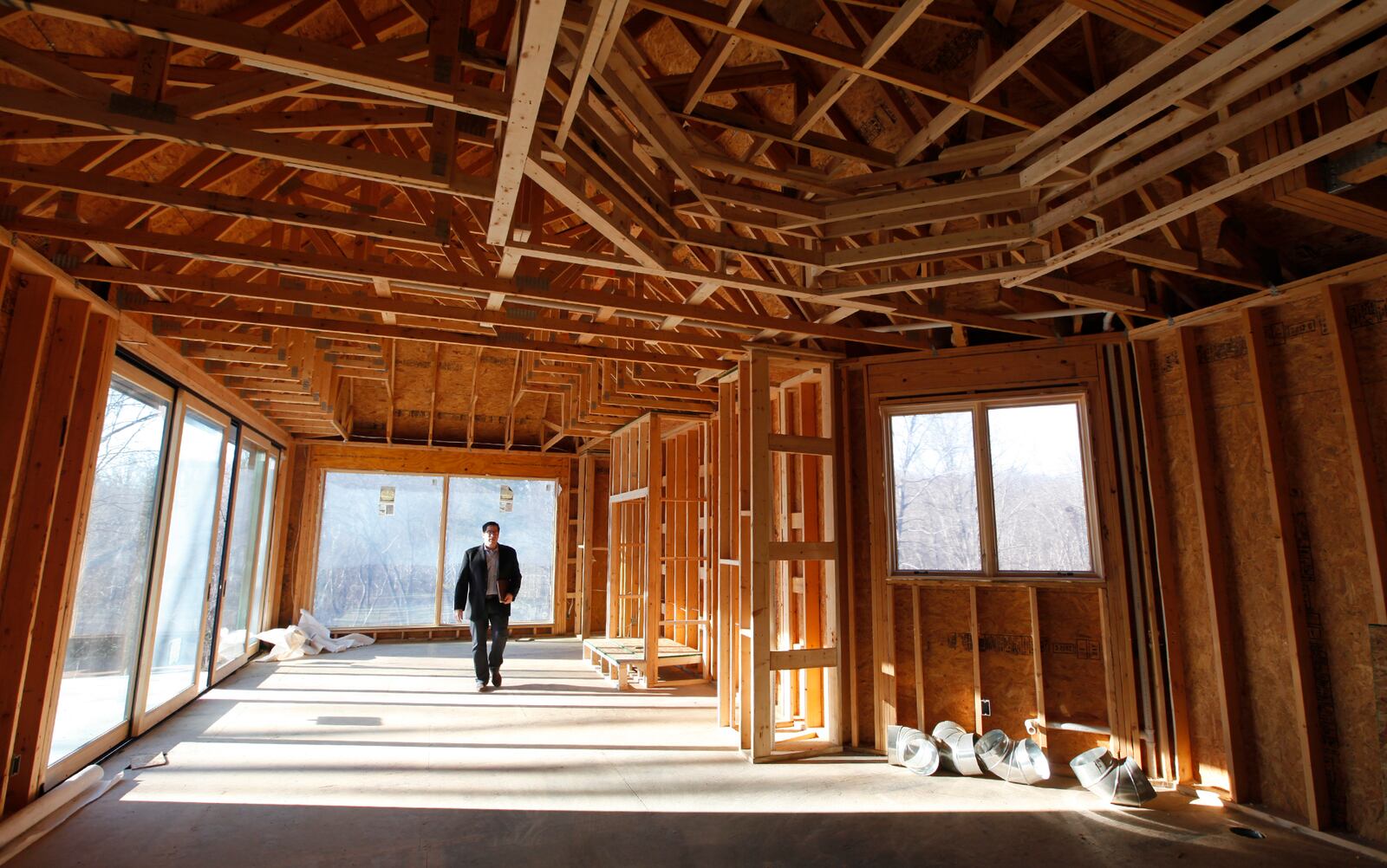 Developer David Klass inside a $3 million home in Clearcreek Twp.which includes a bowling alley, lighted dance floor, gym and a shower in the master bedroom with a built in fish tank. -- Staff Photo by Ty Greenlees