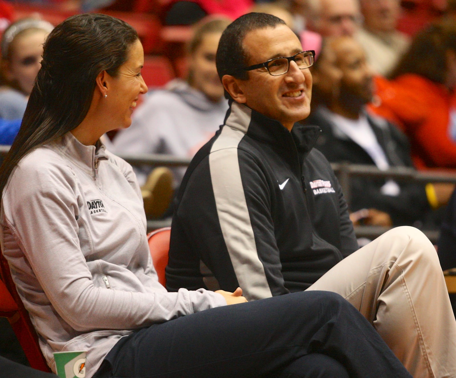 Dayton head coach Jim Jabir, left, and assistant coach Shauna Green talk during practice on Friday, March 27, 2015, at the Times Union Center in Albany, N.Y. David Jablonski/Staff