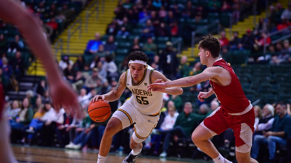 Wright State University's Michael Cooper drives to the hoop during their game against Miami on Dec. 16 at the Ervin J. Nutter Center in Fairborn. JOSEPH R. CRAVEN / CONTRIBUTED PHOTO