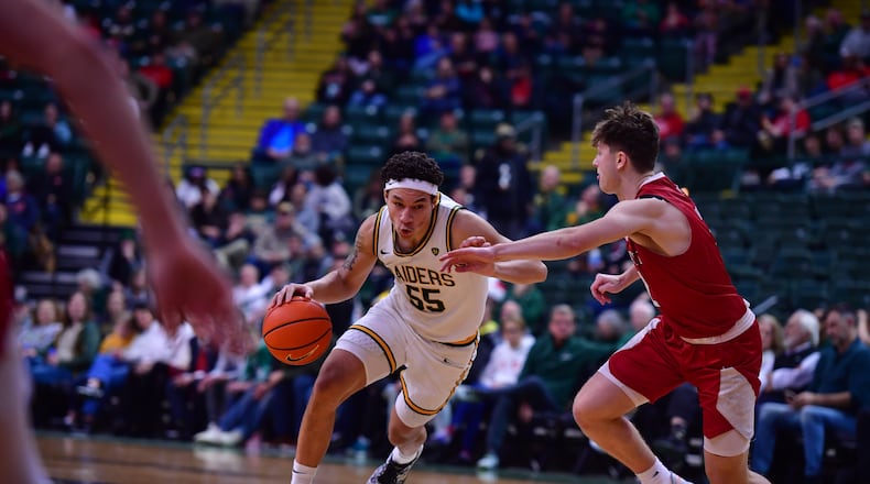 Wright State University's Michael Cooper drives to the hoop during their game against Miami on Dec. 16 at the Ervin J. Nutter Center in Fairborn. JOSEPH R. CRAVEN / CONTRIBUTED PHOTO