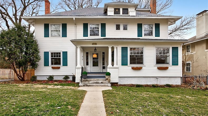 This remodeled Oakwood three story home was originally built in 1907 and has 5-6 bedrooms and an unfinished basement. It sits on a .31 acre lot.