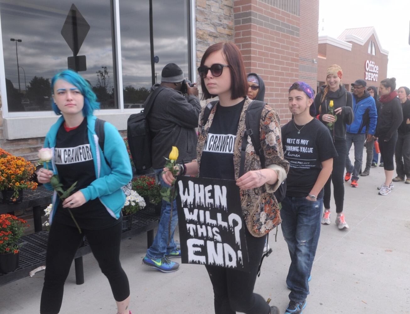 John Crawford supporters gather at Walmart