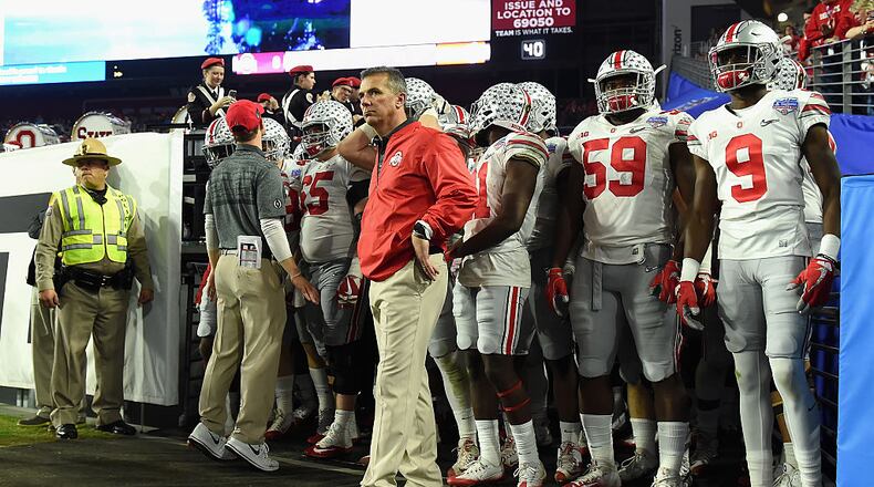 GLENDALE, AZ - DECEMBER 31: Head coach Urban Meyer of the Ohio State Buckeyes takes the field during the second half against the Clemson Tigers during the 2016 PlayStation Fiesta Bowl at University of Phoenix Stadium on December 31, 2016 in Glendale, Arizona. (Photo by Norm Hall/Getty Images)
