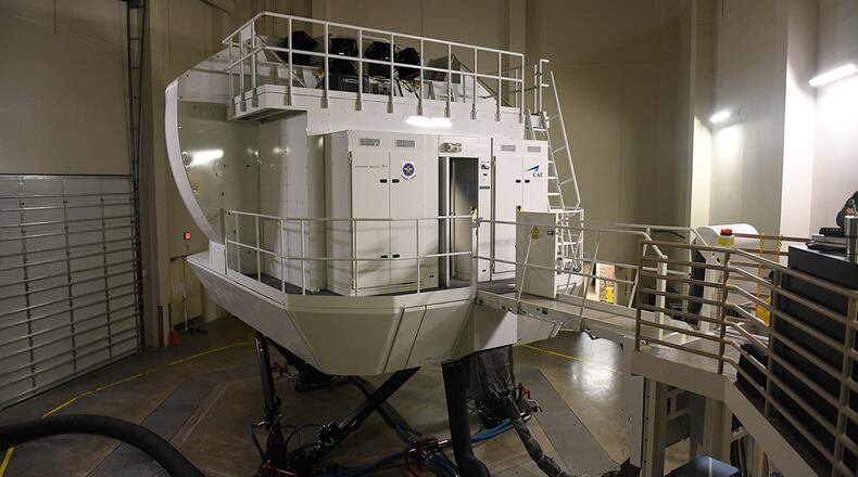 The Center of Excellence at Little Rock Air Force Base uses simulators as a way to train aircrew. A SIM is a machine that provides a realistic imitation of an aircraft and is used for training purposes. The simulators have a variety of features: day and night imitations, accurate terrain maps of different locations world-wide and simulated malfunctions in an aircraft. U.S. AIR FORCE PHOTO/AIRMAN 1ST CLASS CODIE COLLINS