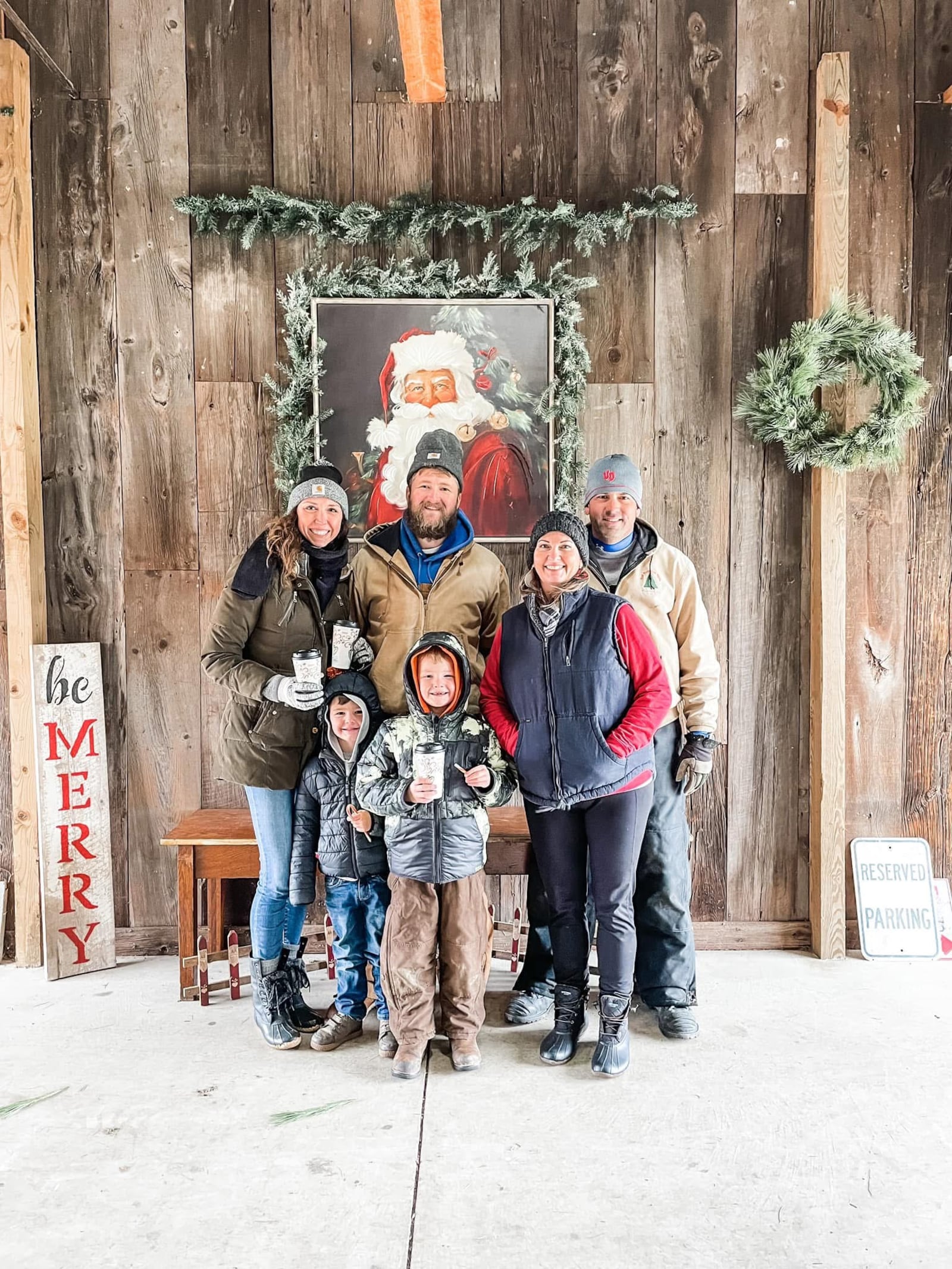 Cutting down the Christmas tree is a family tradition for many of those who venture out to Red Barn Tree Farm in Miamisburg. CONTRIBUTED