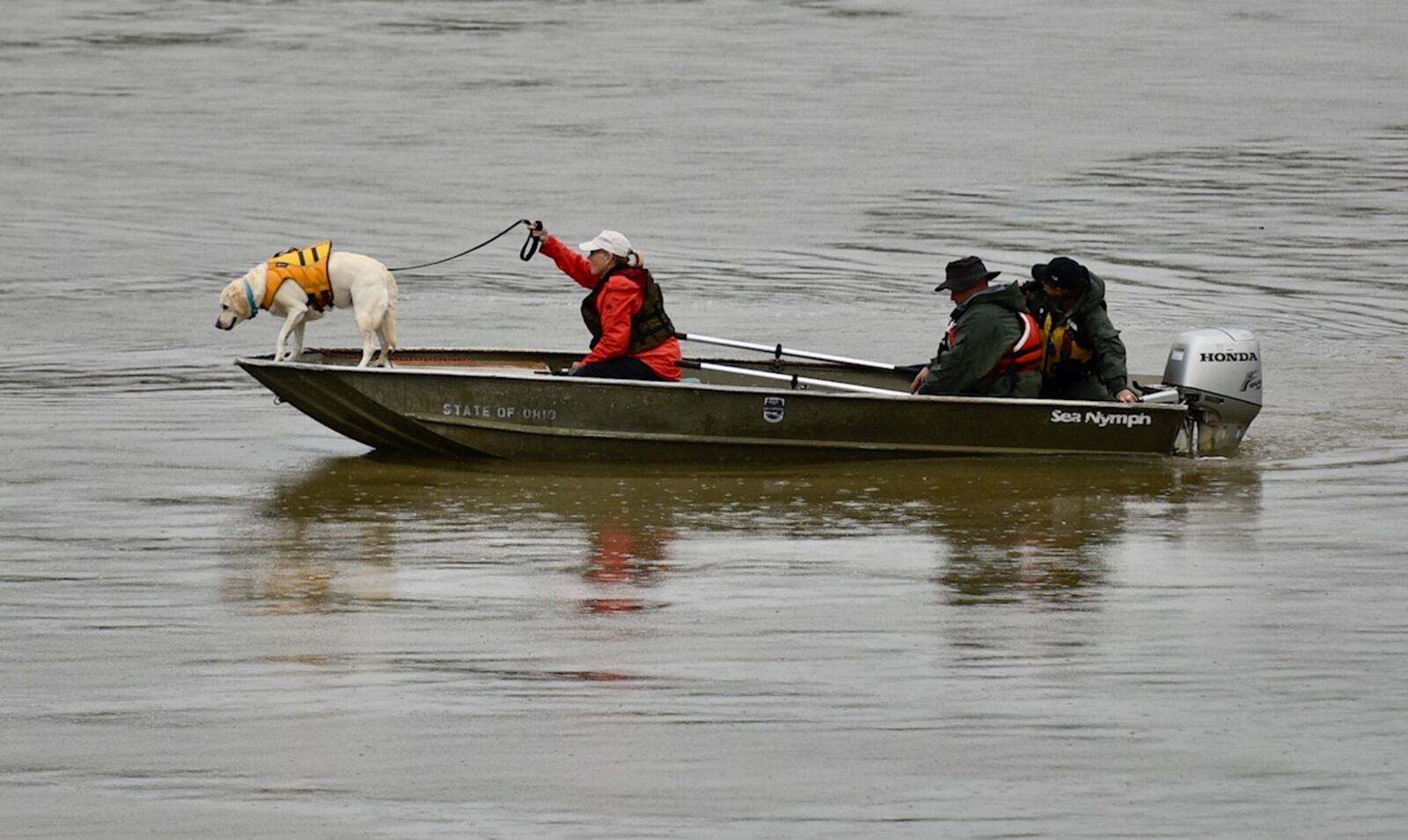 Water rescue crews continued their search Monday for the body of a man who went into the Great Miami River after his kayak flipped. 