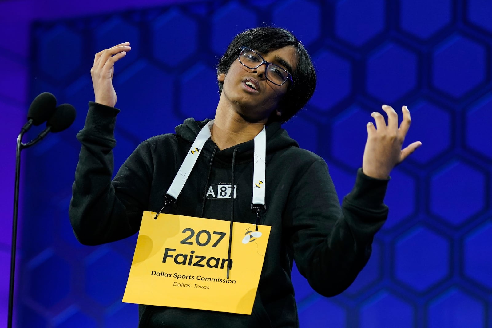 Faizan Zaki, 13, of Dallas, reacts as he competes in the finals of the Scripps National Spelling Bee at the Gaylord National Resort & Convention Center Thursday, May 29, 2025, in Oxon Hill, Md. (AP Photo/Jose Luis Magana)