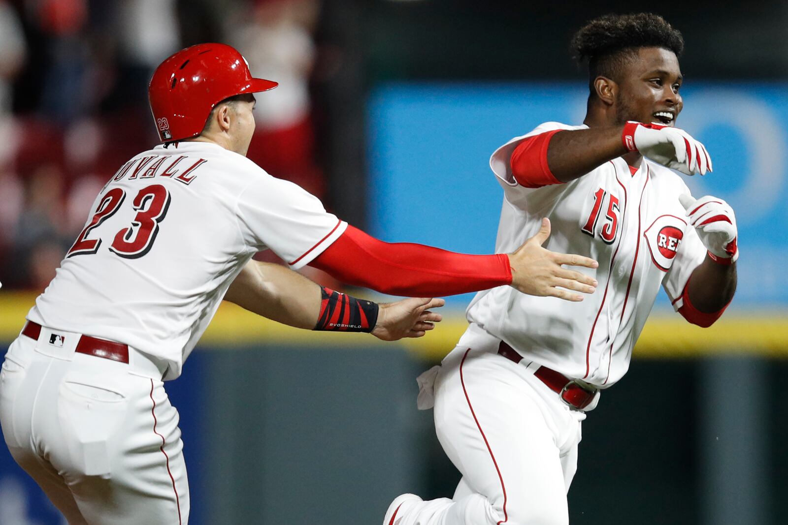 CINCINNATI, OH - JULY 23: Dilson Herrera #15 of the Cincinnati Reds celebrates after hitting a game-winning single in the ninth inning against the St. Louis Cardinals during a game at Great American Ball Park on July 23, 2018 in Cincinnati, Ohio. The Reds won 2-1. (Photo by Joe Robbins/Getty Images)
