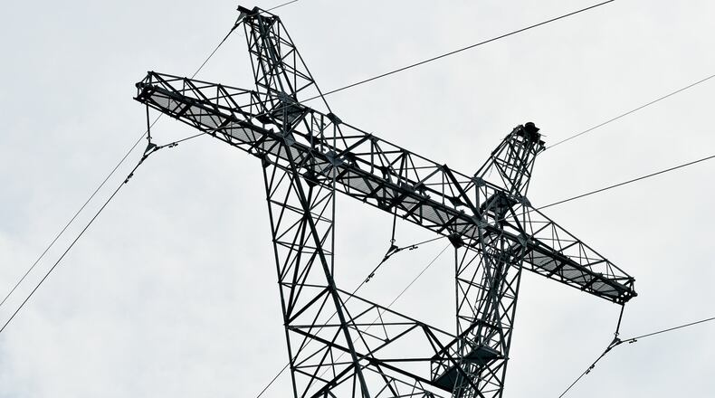Costs of moving electricity over power lines like these have been increasing dramatically. These are the transmission lines that cross the Ohio river into Ohio. NICK GRAHAM/STAFF