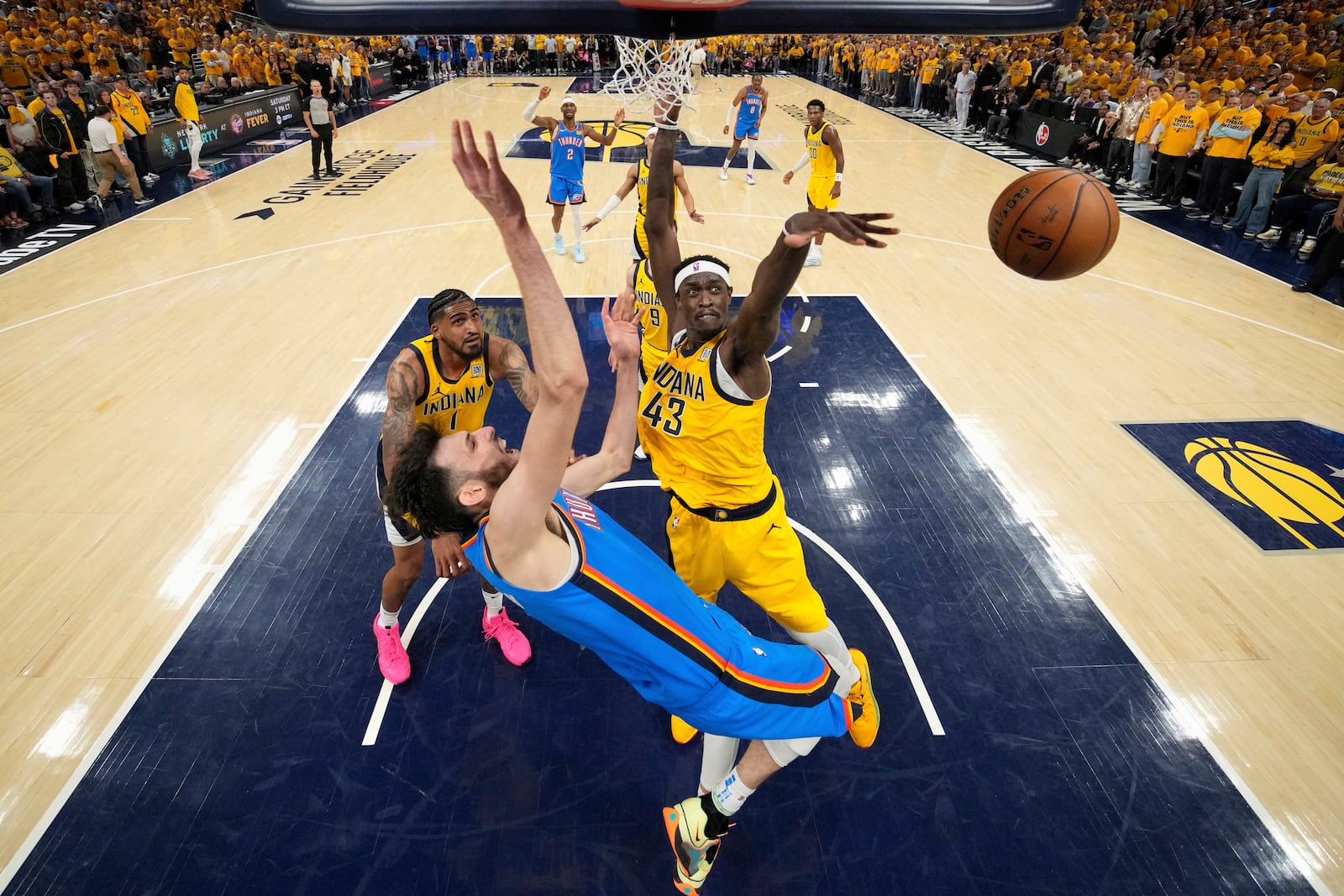 Indiana Pacers forward Pascal Siakam (43) defends against Oklahoma City Thunder forward Chet Holmgren (7) during the second half of Game 3 of the NBA Finals basketball series, Wednesday, June 11, 2025, in Indianapolis. (Kyle Terada/Pool Photo via AP)