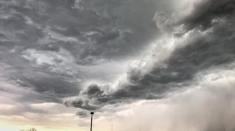 A storm moves into Dayton April 9, 2021. JIM NOELKER / STAFF