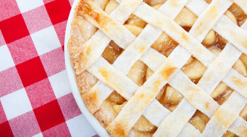Some Midwesterners enjoy a slice of cheese with their apple pie. Others think the food pairing sounds gross. (Brenda Carson/Dreamstime/TNS)