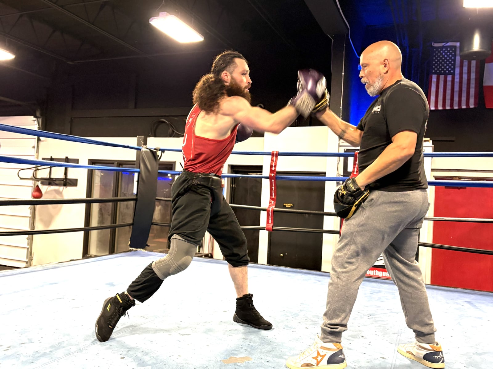 Unbeaten middleweight Jrue Louis King works in the ring with Daniel Meza-Cuadra, his trainer, his friend and the owner of the DMC Boxing Academy in Centerville. TOM ARCHDEACON