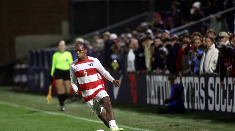 Dayton's Geni Kanyane dribbles against Davidson in the quarterfinals of the A-10 tournament on Friday, Nov. 8, 2024, at Baujan Field in Dayton. David Jablonski/Staff