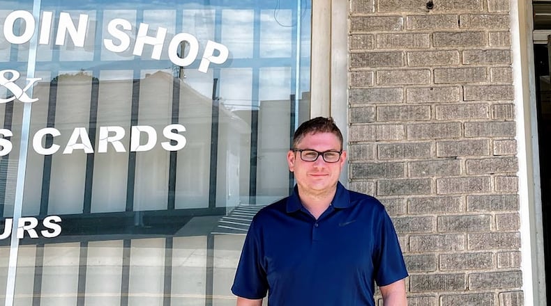 Owner Ryan Davis stands outside the Xenia Coin Shop. Cosette Gunter/Staff Photo