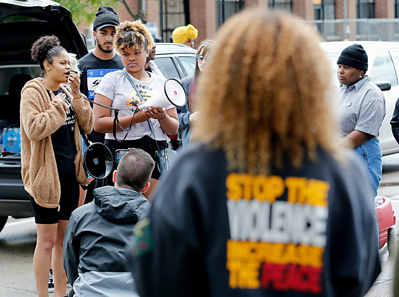 PHOTOS: Demonstrators rally for justice in Beavercreek