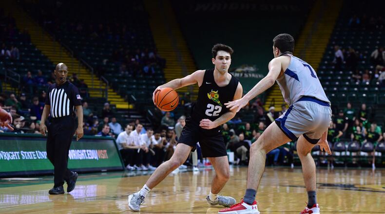 Wright State's Andrew Welage is defended by Alvaro Folgueiras of Robert Morris during a game at the Nutter Center on Feb. 17, 2024. Joe Craven/Wright State Athletics