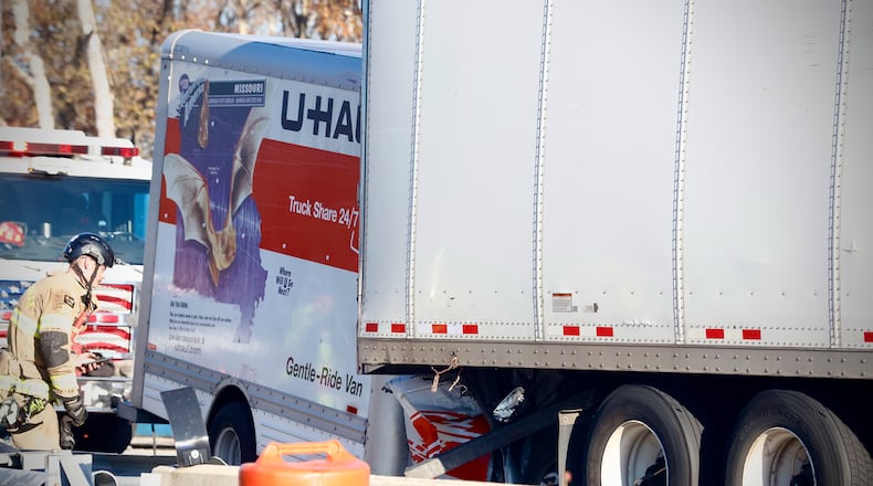 At least one person was killed when a U-Haul truck struck the back of a semi on U.S. 35 near Trebein Road on Saturday morning, Nov. 2, 2024. MARSHALL GORBY / STAFF