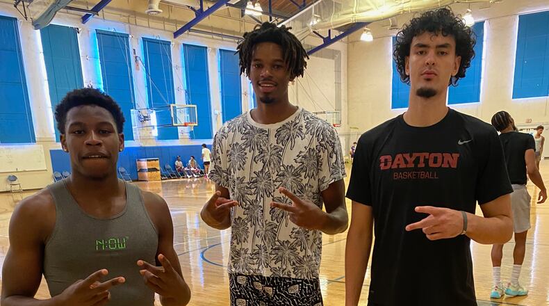Dayton's Malachi Smith, DaRon Holmes II and Mustapha Amzil pose for a photo at UCLA’s Student Activities Center in August, 2022. Photo by Chris Williams