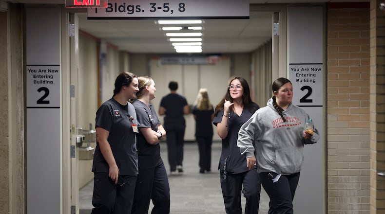 The hallways were busy at Sinclair Community College Monday, Aug. 26, 2024 on the first day of classes. More than 15,500 students are enrolled for fall semester. MARSHALL GORBY\STAFF