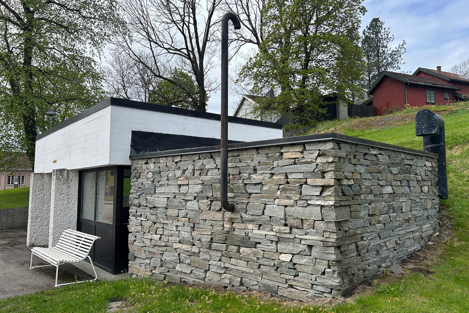 The above-ground entrance to a public shelter, which can fit around 450 people in case of crisis or war, is seen in Kongsberg, Norway Thursday, May 8, 2025. (AP Photo/Emma Burrows)