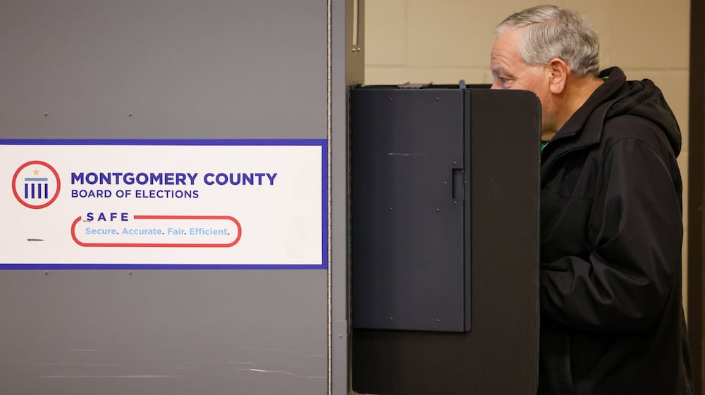 A voter makes selections at a digital machine at a polling location at New Season Ministry on Tuesday, Nov. 4 in Huber Heights. Poll workers said at around 11 a.m. turnout was slightly lower than normal compared to similar cycles. Huber Heights voters did not have many contested races and decided on one issue, a renewal Montgomery County property tax. BRYANT BILLING/STAFF