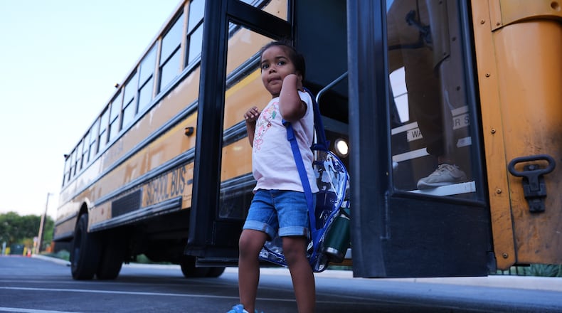 Pre-K 4 SA students arrive by school bus, Oct. 9, 2025, in San Antonio. (AP Photo/Eric Gay)
