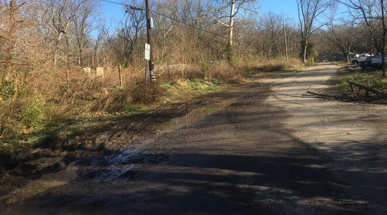 On Monday, Nov. 16, 2020, trees and power lines were still down across Birch Drive in Harrison Twp. after storms and high winds swept through the Miami Valley on Nov. 15. STAFF/PARKER PERRY