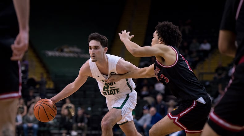 Wright State's Andrew Welage drives past an IUPUI defender during Wednesday night's game at the Nutter Center. Joe Craven/Wright State Athletics