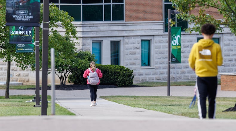 Wright State students walk on campus on Tuesday, Aug. 26. BRYANT BILLING / STAFF