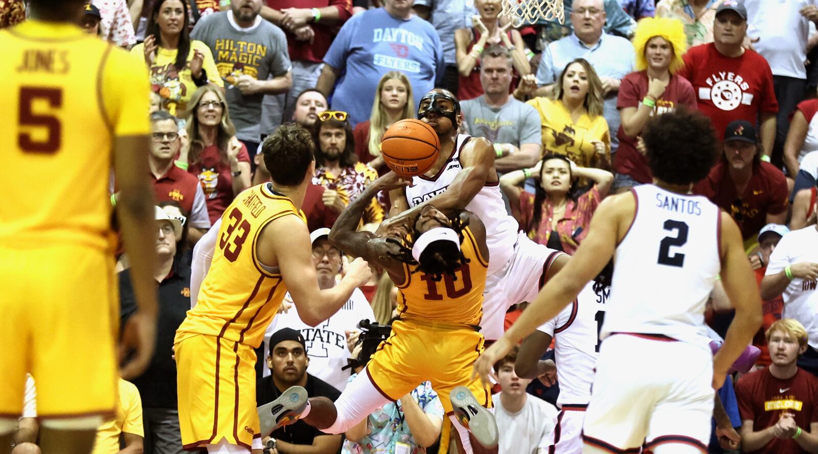 Dayton's Zed Key fouls Iowa State's Keshon Gilbert in the final minute of the consolation round of the Maui Invitational on Monday, Nov. 25, 2024, at the Lahaina Civic Center. Zey was called for a flagrant foul. David Jablonski/Staff