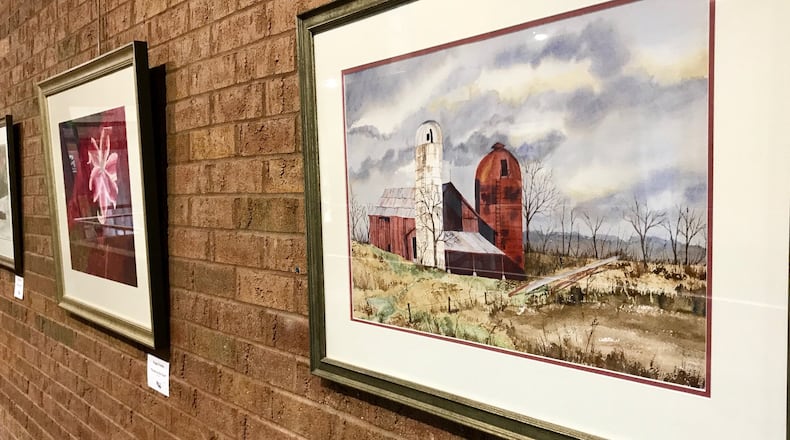 An art display featuring works from local artist Peggy Trimble is on display at the Middletown City Building at 1 Donham Plaza. NICK GRAHAM/STAFF