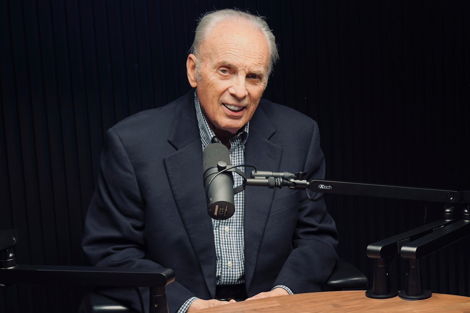 In this photo provided by Answersingenesis.org, Rev. John MacArthur, left, is seen at his Los Angeles studio in 2024. (Answersingenesis.org via AP)