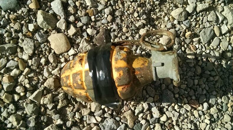 The grenade found Saturday night in the Great Miami River in Middletown. CONTRIBUTED/BUTLER COUNTY SHERIFF’S OFFICE