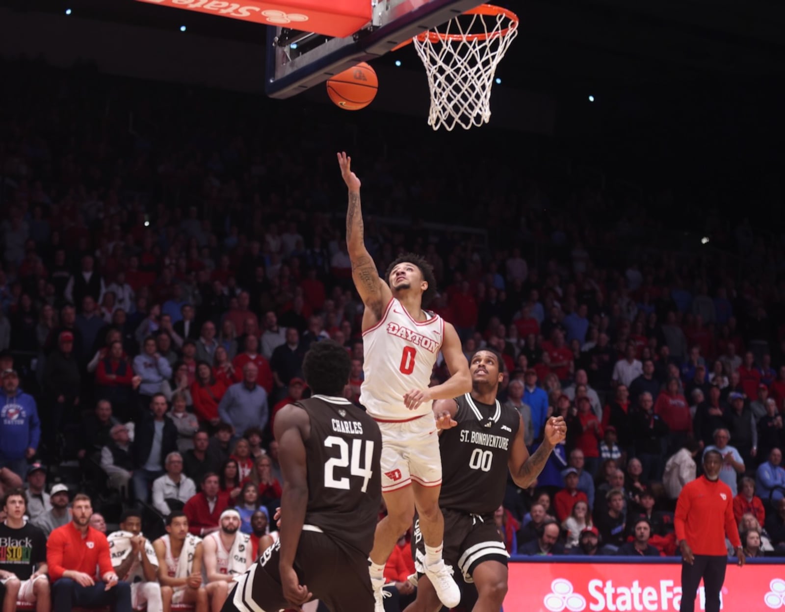 Dayton's Javon Bennett makes a go-ahead layup in the final minute of the game against St. Bonaventure on Tuesday, Feb. 3, 2026, at UD Arena. David Jablonski/Staff