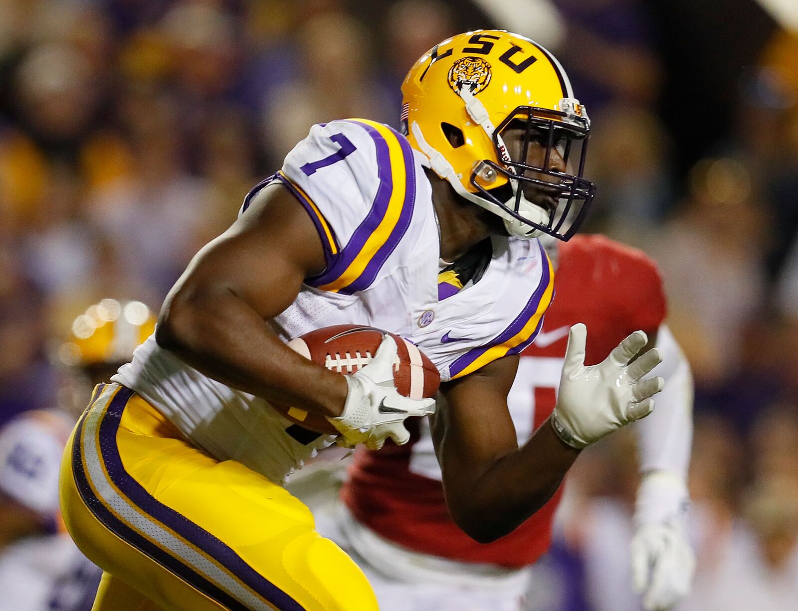 BATON ROUGE, LA - NOVEMBER 05: Leonard Fournette #7 of the LSU Tigers rushes against the Alabama Crimson Tide at Tiger Stadium on November 5, 2016 in Baton Rouge, Louisiana. (Photo by Kevin C. Cox/Getty Images)