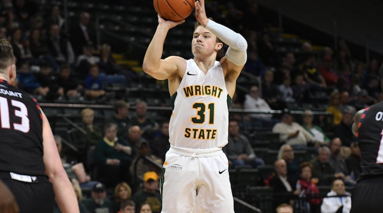 Wright State point guard Cole Gentry shoots against UIC earlier this season at the Nutter Center. Joseph Craven/CONTRIBUTED
