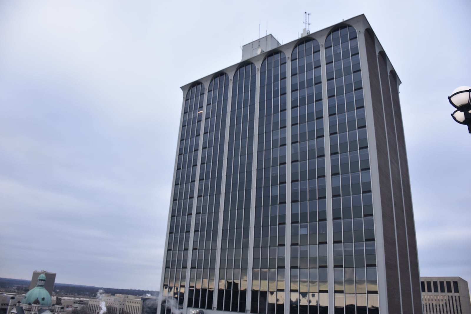 The Deneau at 40 W. Fourth St. in downtown Dayton. Developer Windsor Companies has converted the office tower into 147 apartments and office spaces on the lower levels. CORNELIUS FROLIK / STAFF